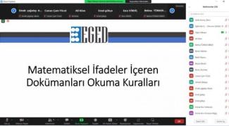 Zoom ekran görüntüsünde; katılımcıların ve sunu ekranı görünüyor. sunuda, Matematik okuma kuralları yazıyor.